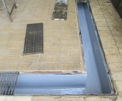 Acabado de trincheras con recubrimiento de resistencia química - Grupo Rex Mantenimiento