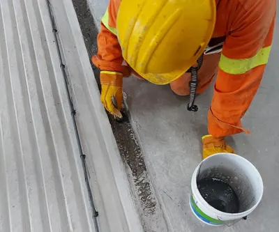 Colocación de adhesivos epoxico para respetar modulo elastico