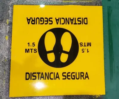 Distancia segura señal piso epóxico Grupo Rex